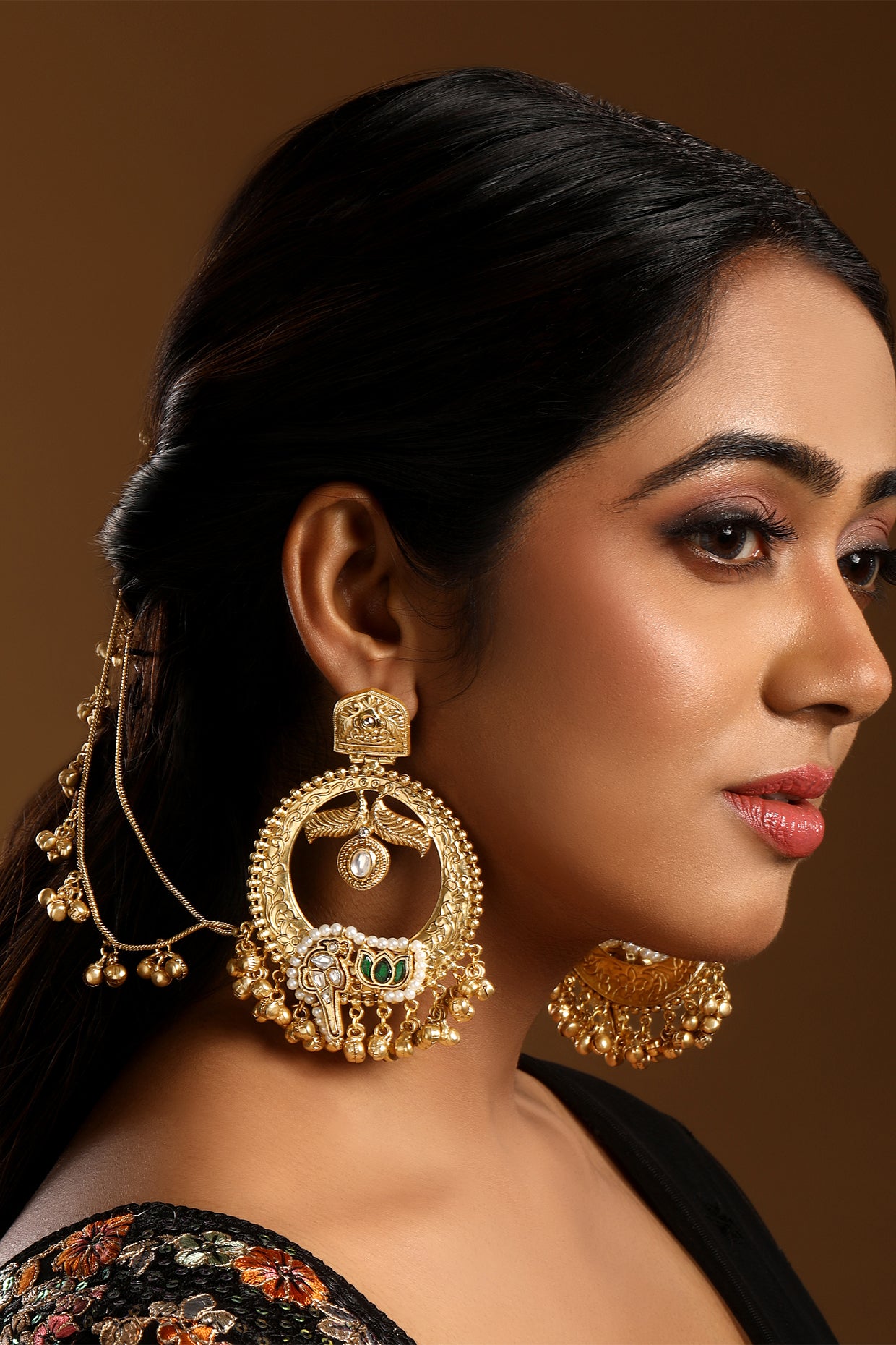 Chandbali With Two Line Ghungrool Ear Chain With Hook. in gold tone brass with Kundan Polki, Pearls, Synthetic Emerald, Gold Gungroo, Have Been Used