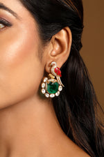 Danglers in gold tone brass with Zircon Diamond, Kundan Polki, Enamel, Synthetic Emerald, Have Been Used