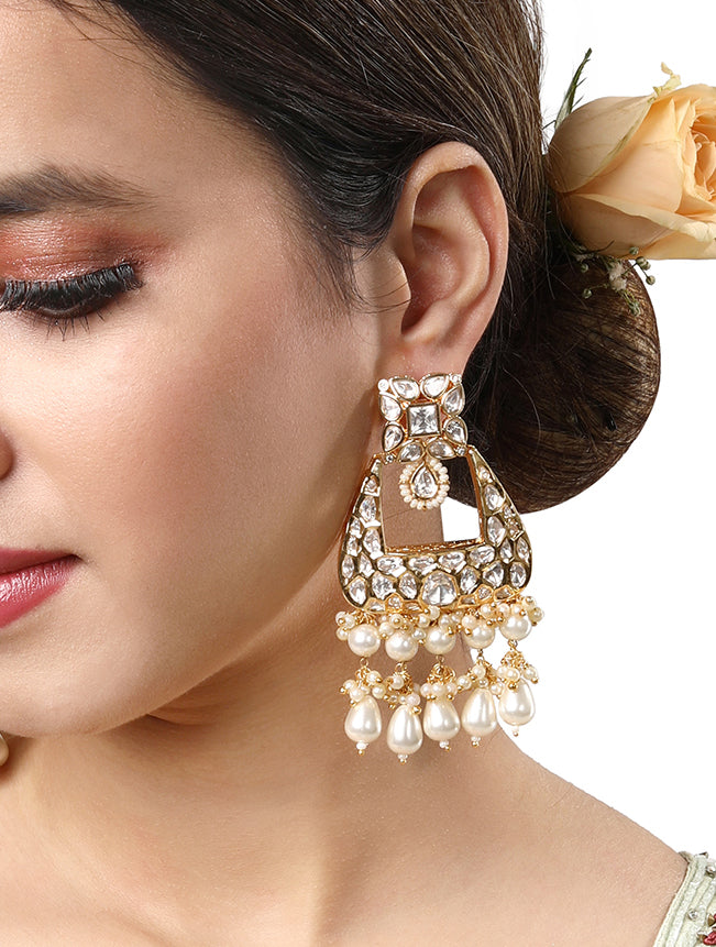 Earring In gold FInished brass,Kundan Polki & Shell pearls.